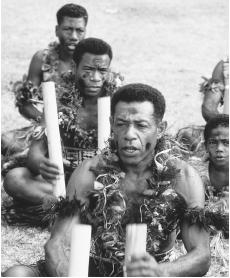 A group of musicians at a Kavo Ceremony. Both sacred and secular music are popular in Fiji.