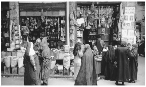 People walk around the bazaar in Damascus. The marketplace is the focal point of every Syrian city.