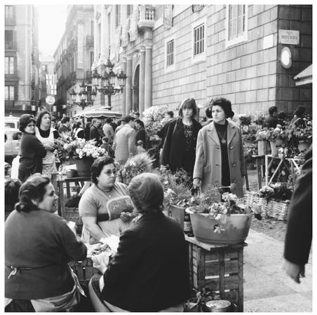 Several women in the flower section of the Rastro Market in Madrid. Spaniards have long accepted the independence of women.